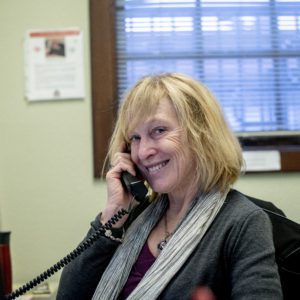 Woman smiling on telephone