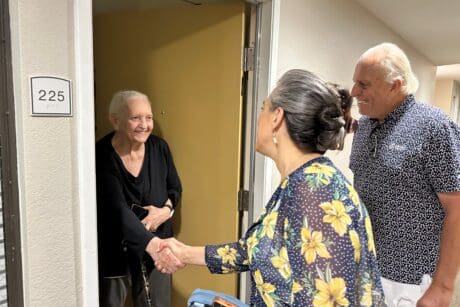 Community Leaders Deliver More Than Meals During Champions Week