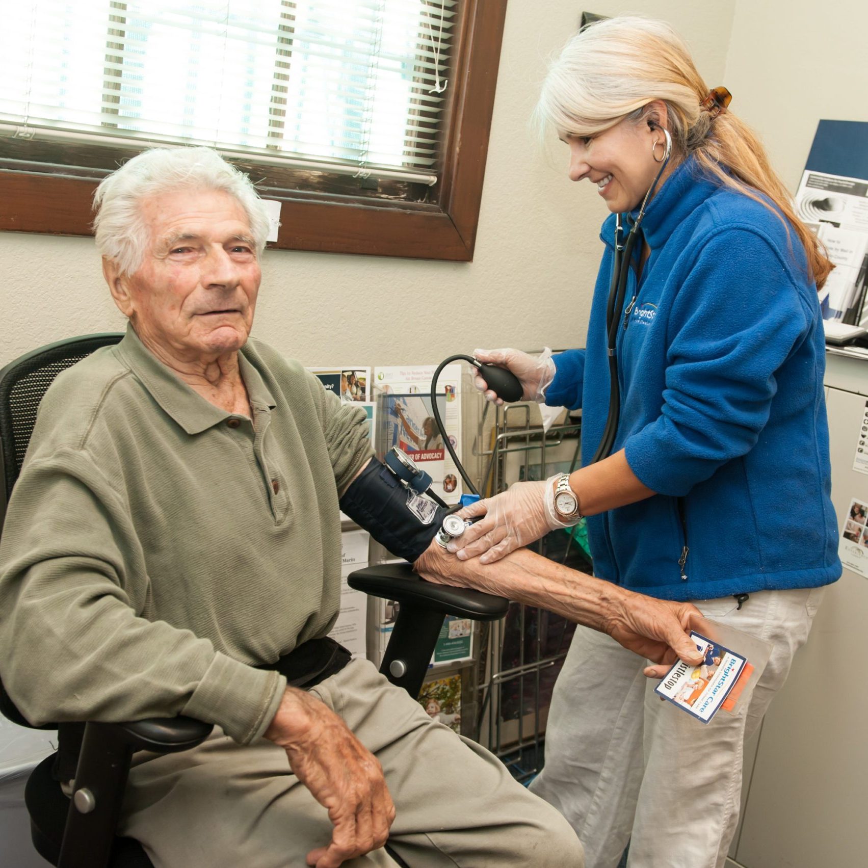 Senior man has blood pressure checked at Vivalon