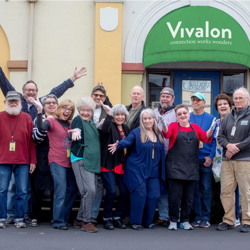 Vivalon volunteers group photo in front of Vivalon building